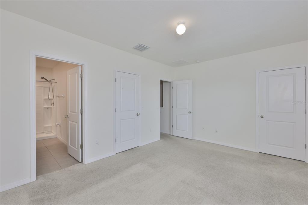 8969 Indigo Trail Loop Riverview, FL 33578 - Photo 26 of 41 a view of an empty room
