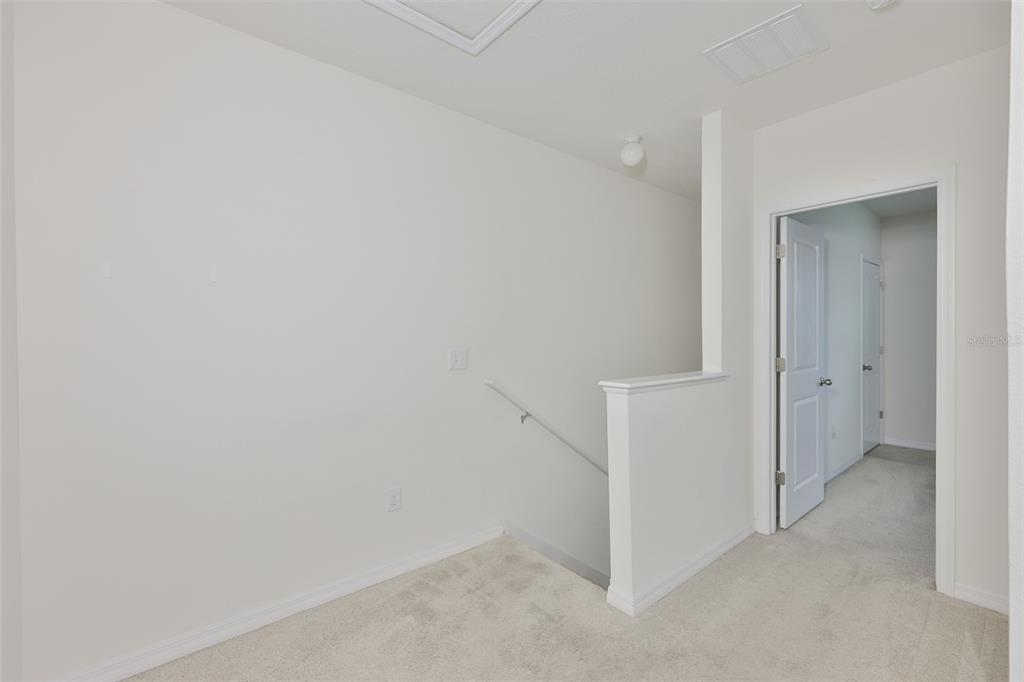 8969 Indigo Trail Loop Riverview, FL 33578 - Photo 28 of 41 a view of an empty room