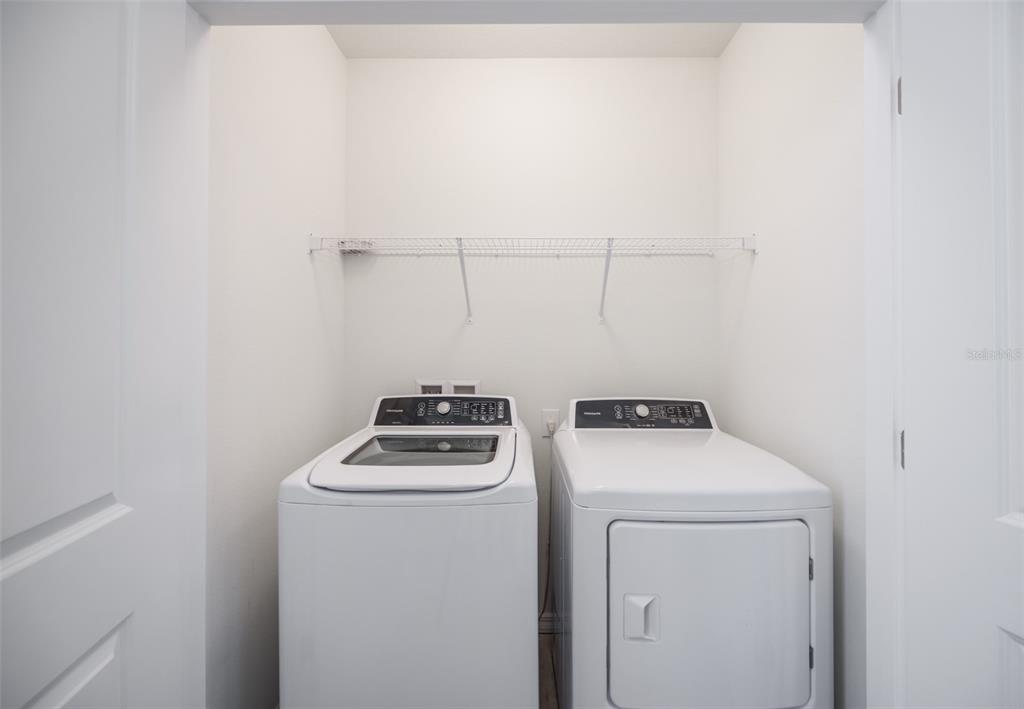 8969 Indigo Trail Loop Riverview, FL 33578 - Photo 29 of 41 a utility room with dryer and washer