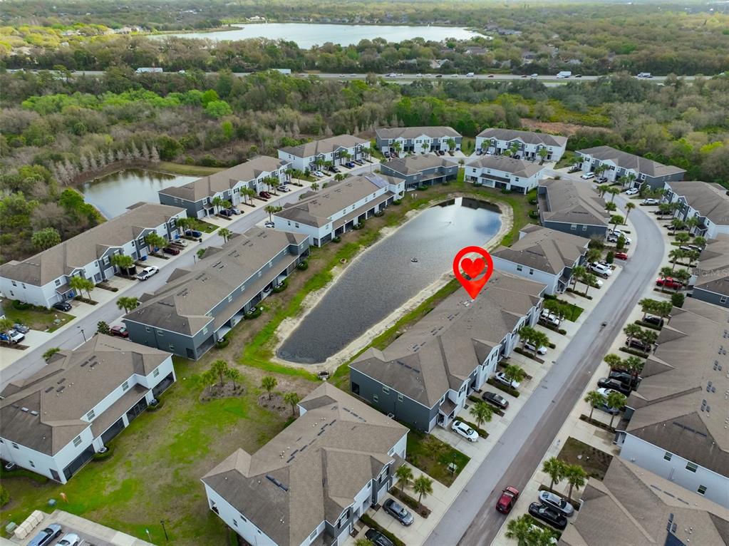 8969 Indigo Trail Loop Riverview, FL 33578 - Photo 39 of 41 an aerial view of a house a yard basket ball court and outdoor seating