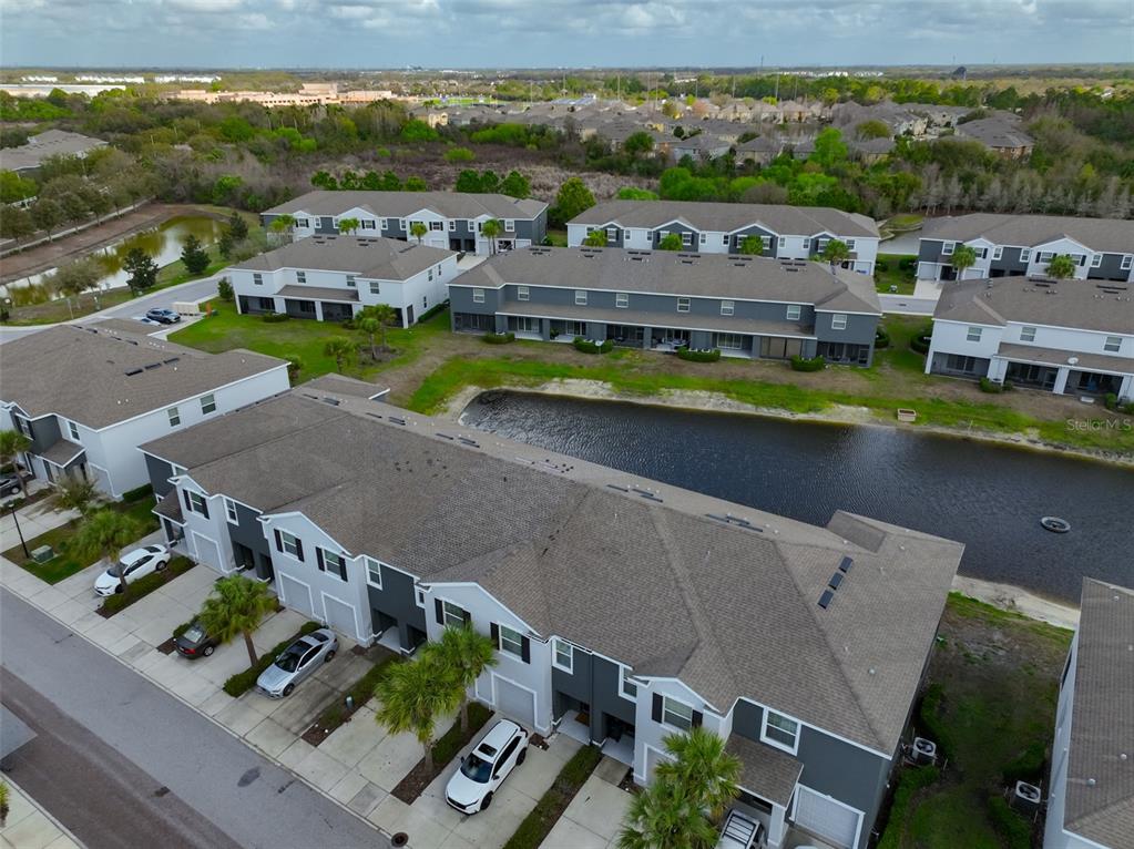 8969 Indigo Trail Loop Riverview, FL 33578 - Photo 40 of 41 an aerial view of a house with a garden