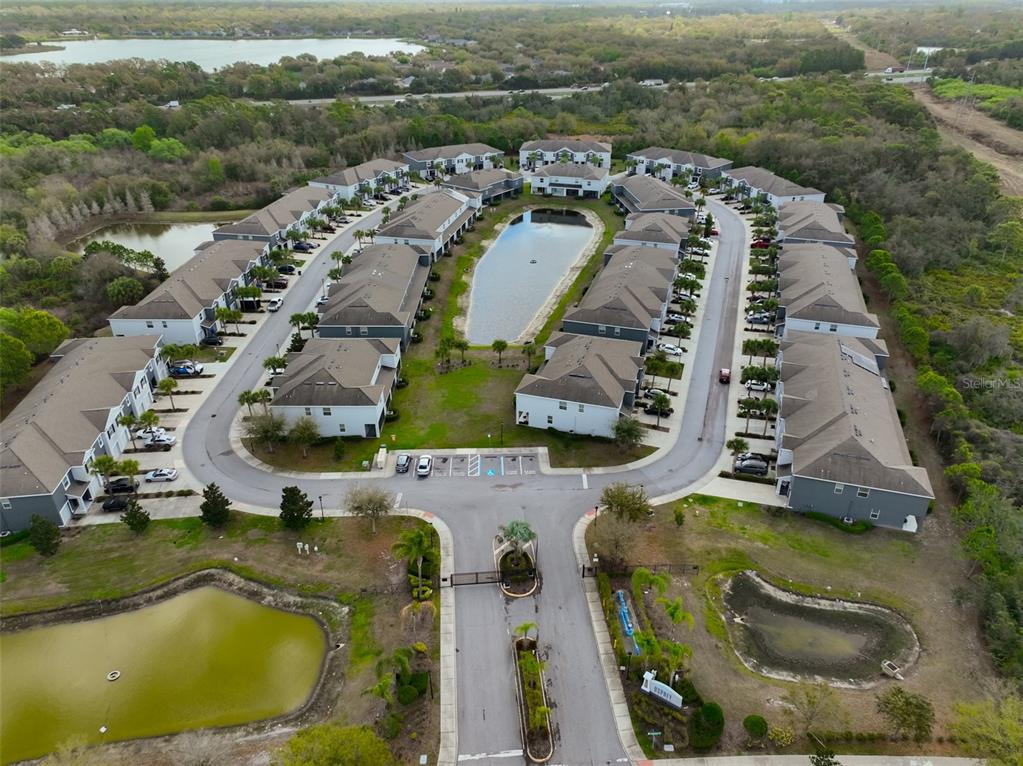 8969 Indigo Trail Loop Riverview, FL 33578 - Photo 41 of 41 an aerial view of a house with a swimming pool