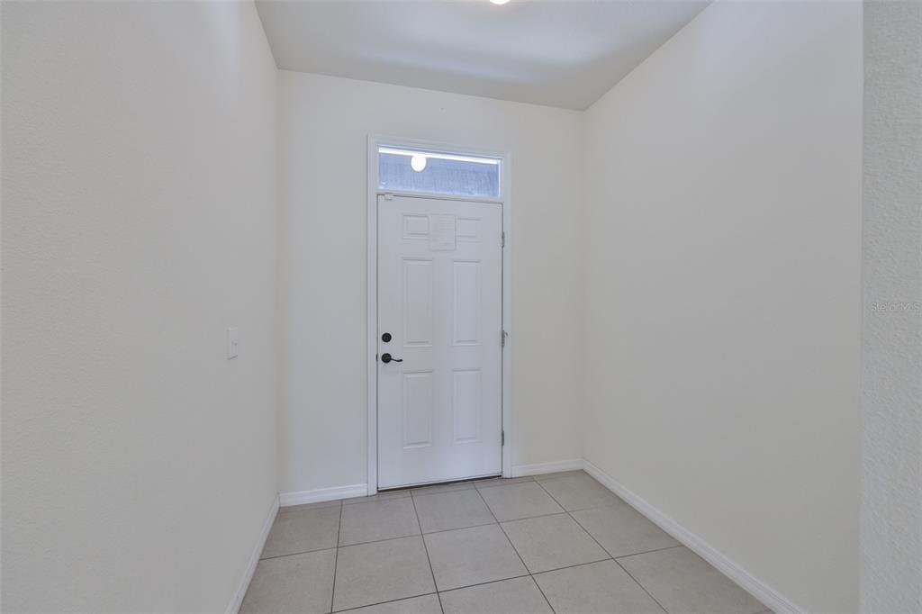 8969 Indigo Trail Loop Riverview, FL 33578 - Photo 5 of 41 a view of an empty room
