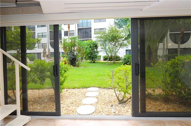 a view of a porch with a yard