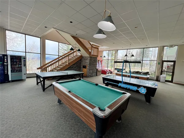 a balcony with furniture and window