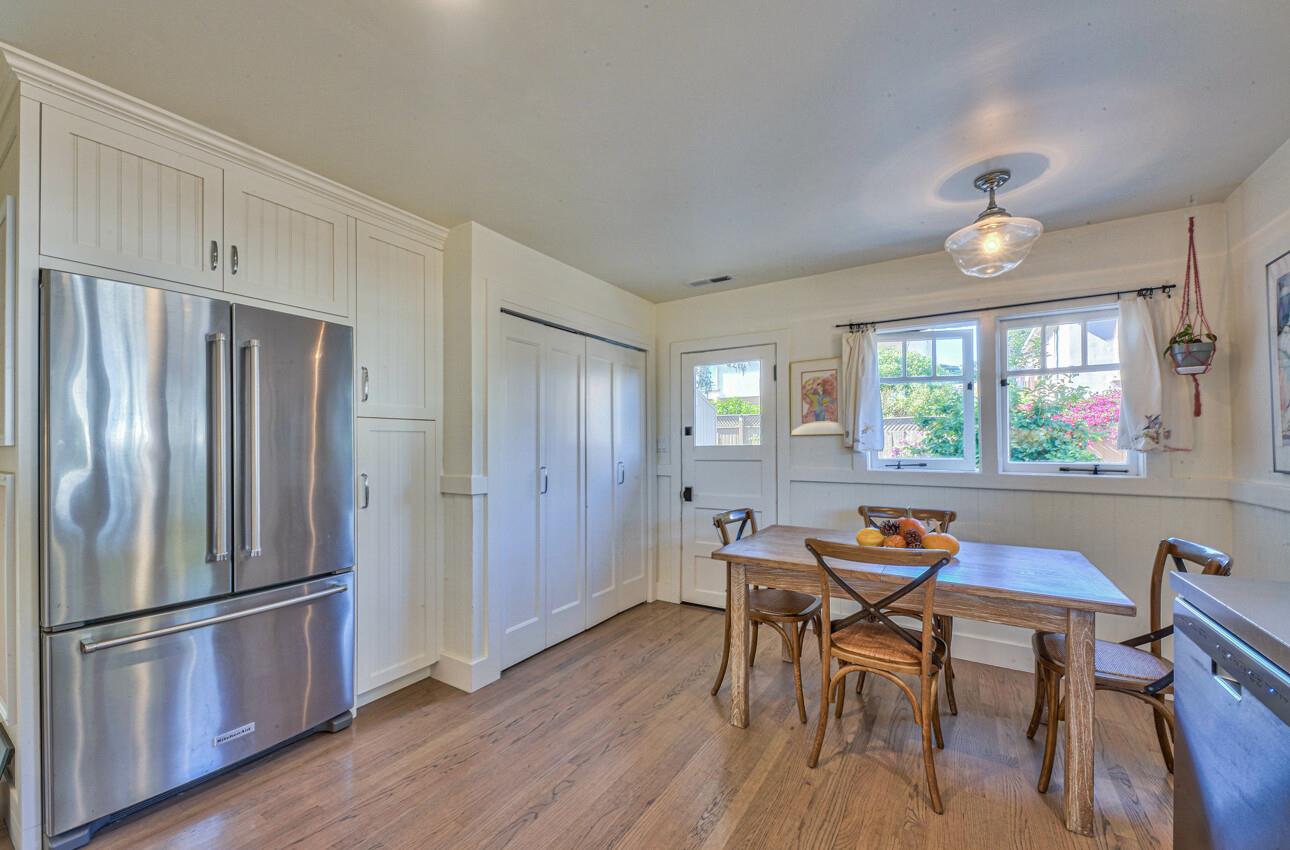 324 Eardley Avenue Pacific Grove, CA 93950 - Photo 12 of 29 a view of a dining room with furniture window and wooden floor