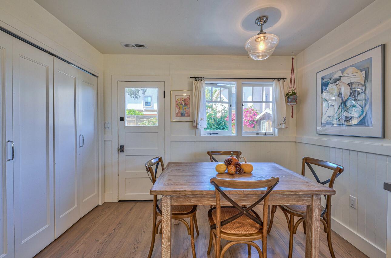 324 Eardley Avenue Pacific Grove, CA 93950 - Photo 14 of 29 a view of a dining room with furniture window and wooden floor