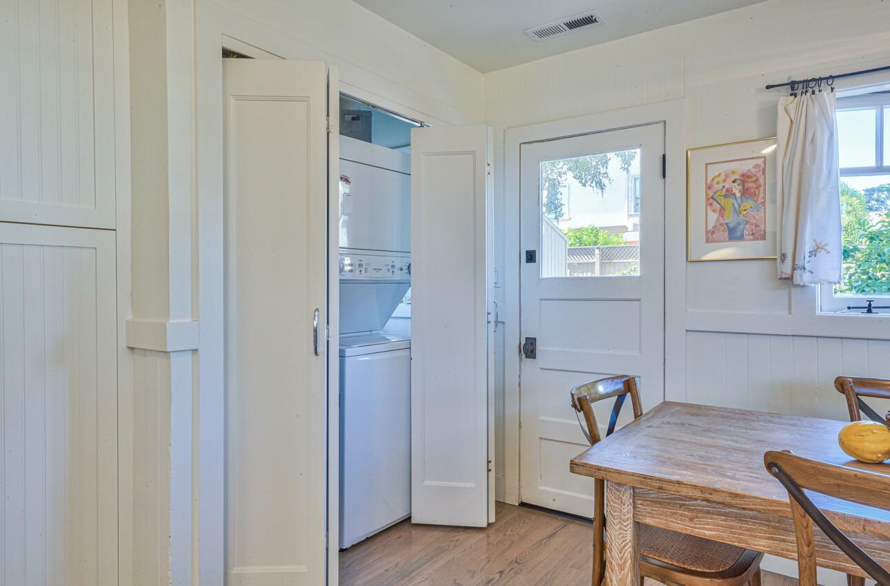 324 Eardley Avenue Pacific Grove, CA 93950 - Photo 15 of 29 a view of a workspace with furniture and window
