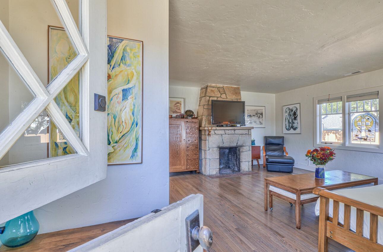 324 Eardley Avenue Pacific Grove, CA 93950 - Photo 5 of 29 a living room with stainless steel appliances furniture and a kitchen view