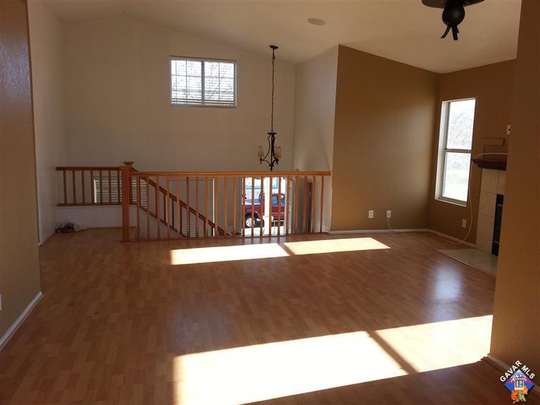 37033 Boxleaf Road Palmdale, CA 93550 - Photo 6 of 15 a view of entryway and hall with wooden floor