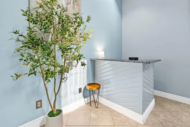 a vase of flowers sitting on a table