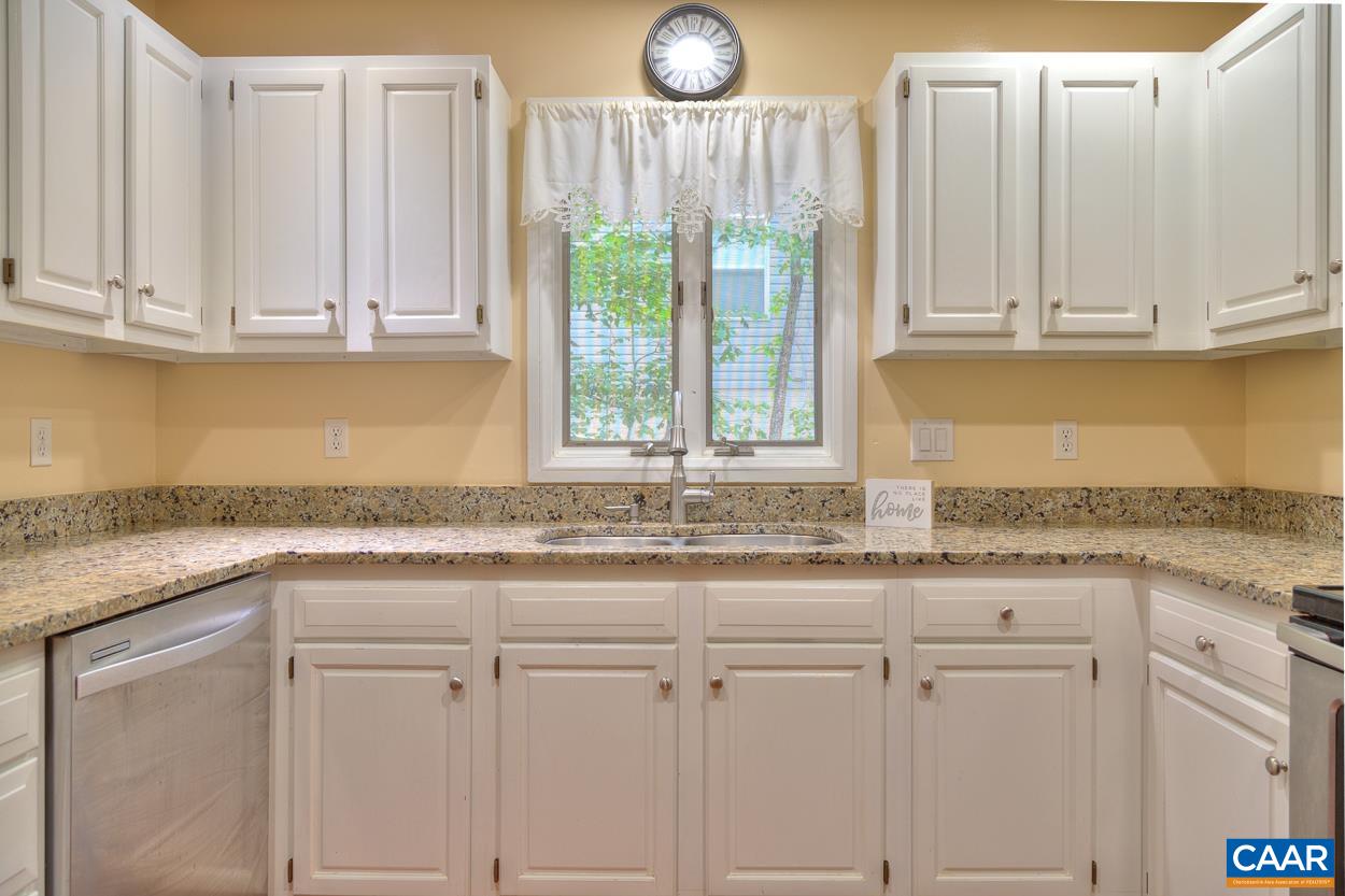 7 Stonewall Road Palmyra, VA 22963 - Photo 11 of 55 a kitchen with granite countertop white cabinets and a window