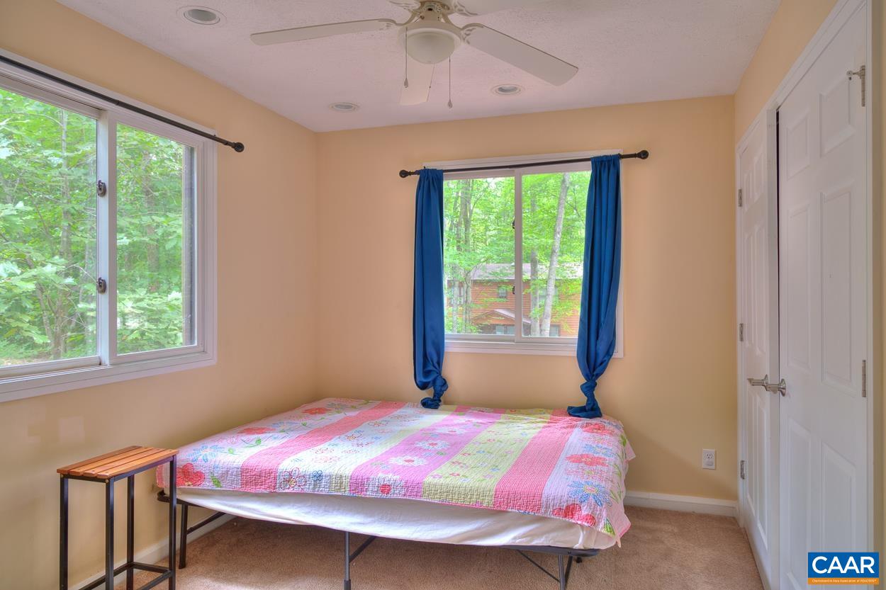 7 Stonewall Road Palmyra, VA 22963 - Photo 20 of 55 a bedroom with a bed and a window