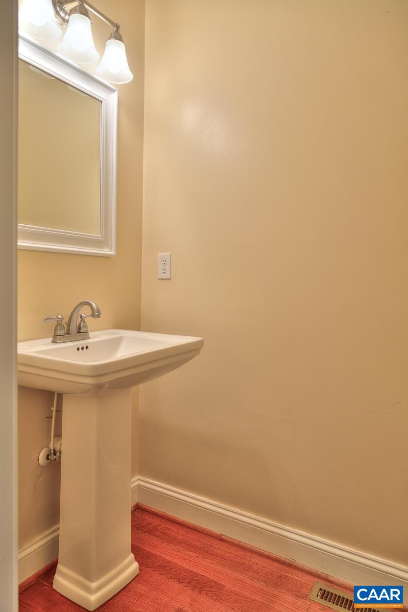 7 Stonewall Road Palmyra, VA 22963 - Photo 22 of 55 a bathroom with a sink and a mirror
