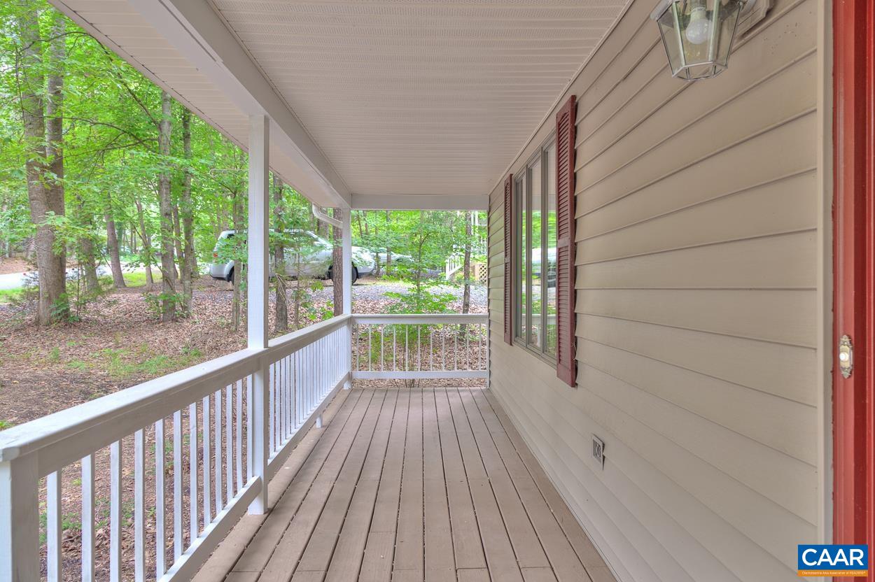 7 Stonewall Road Palmyra, VA 22963 - Photo 3 of 55 a view of a porch with wooden floor and outdoor space