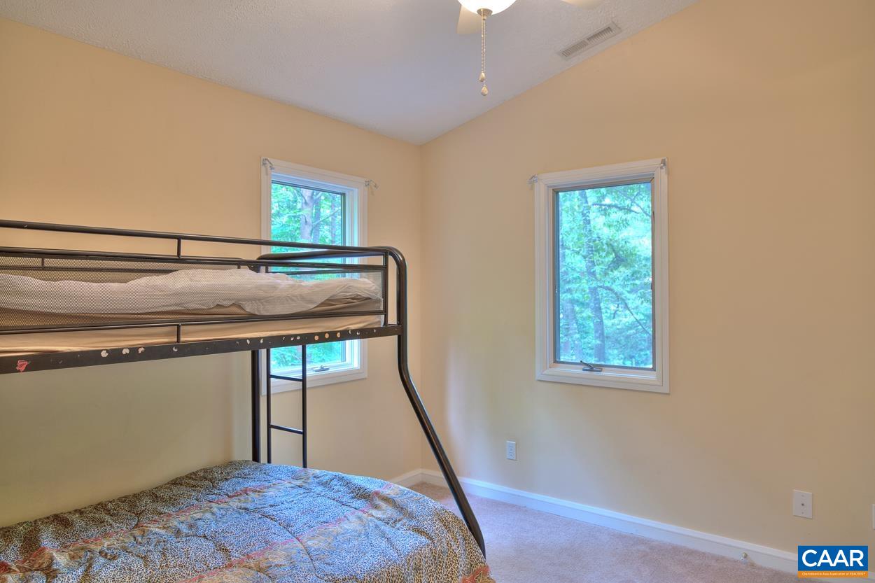 7 Stonewall Road Palmyra, VA 22963 - Photo 32 of 55 a bedroom with bed and window
