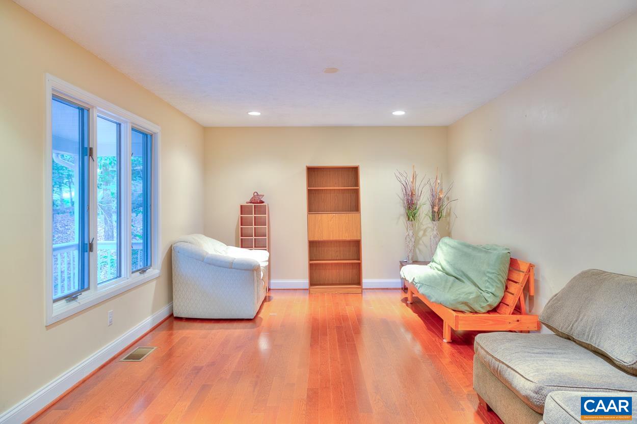 7 Stonewall Road Palmyra, VA 22963 - Photo 7 of 55 a living room with furniture and a wooden floor