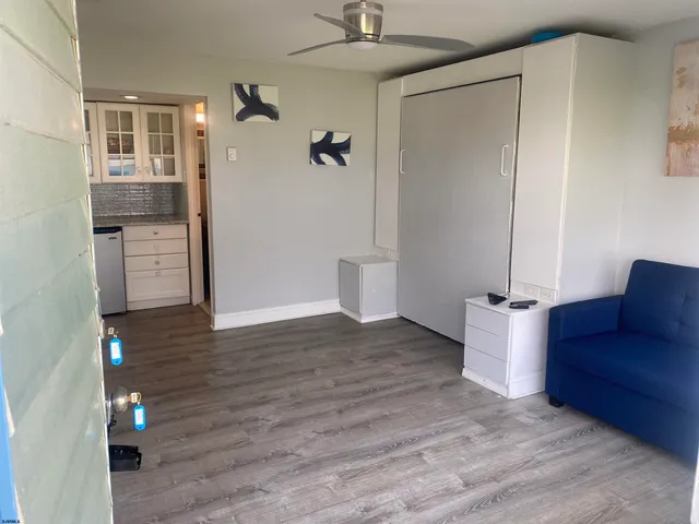 a bathroom with a toilet and shower