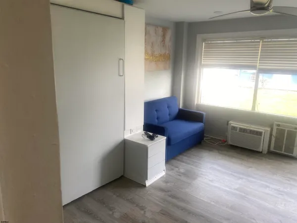 a view of livingroom with furniture and window