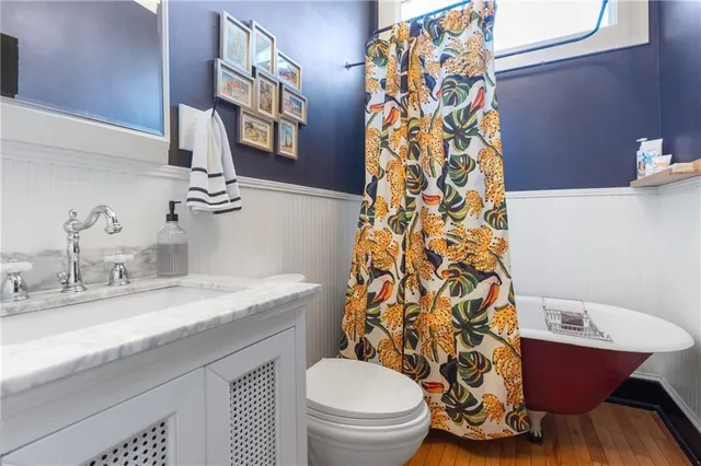 a outdoor living space with patio furniture and a fireplace