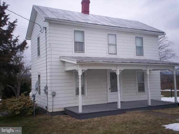 2195 Clary Road Strasburg, VA 22657 - Photo 1 of 8 a front view of a house with a yard