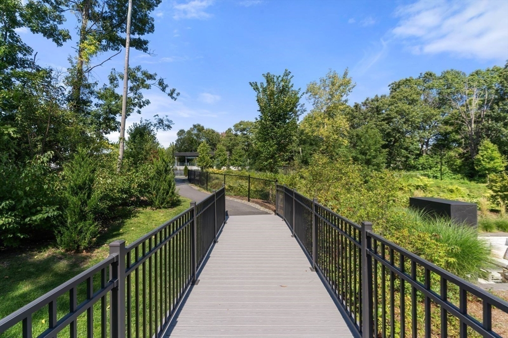 60 Coppersmith Way, Unit 304 Canton, MA 02021 - Photo 32 of 42 a view of balcony and yard