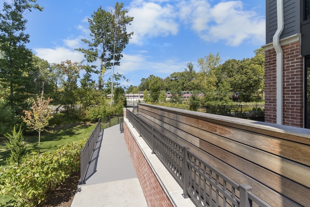 60 Coppersmith Way, Unit 304 Canton, MA 02021 - Photo 33 of 42 a view of balcony