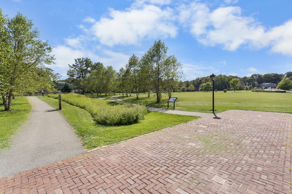 60 Coppersmith Way, Unit 304 Canton, MA 02021 - Photo 42 of 42 a view of a park with large trees