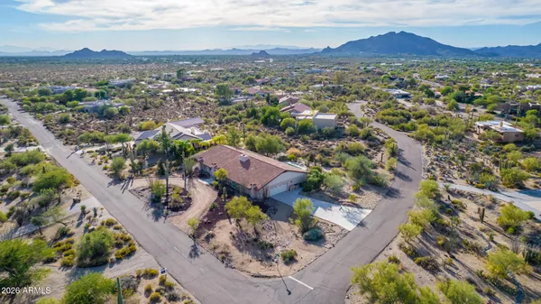an aerial view of residential house with outdoor space