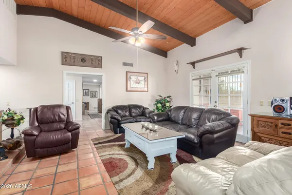 a living room with furniture and a window