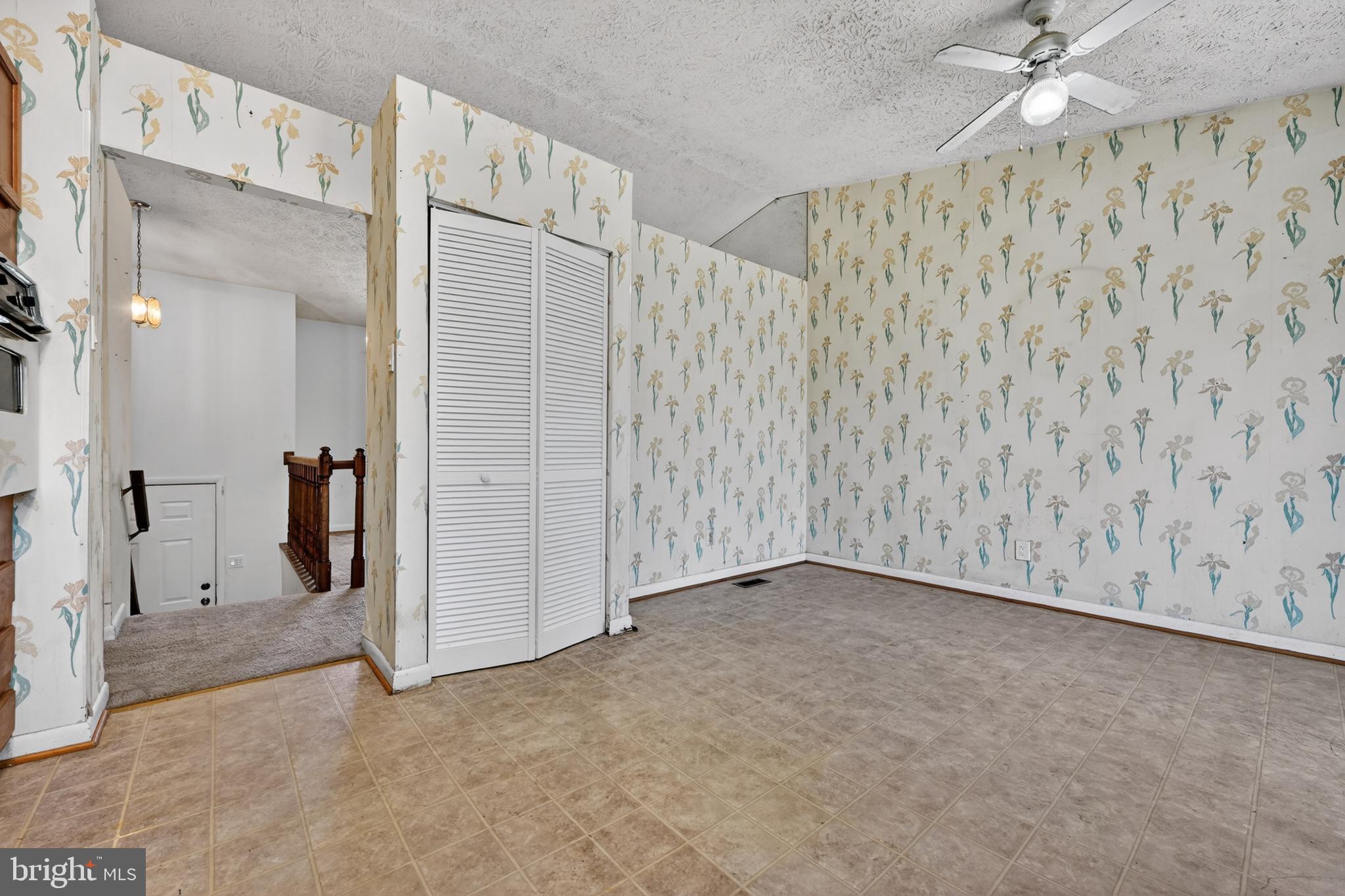 7838 Tick Neck Road Pasadena, MD 21122 - Photo 12 of 20 a view of a room with an entryway