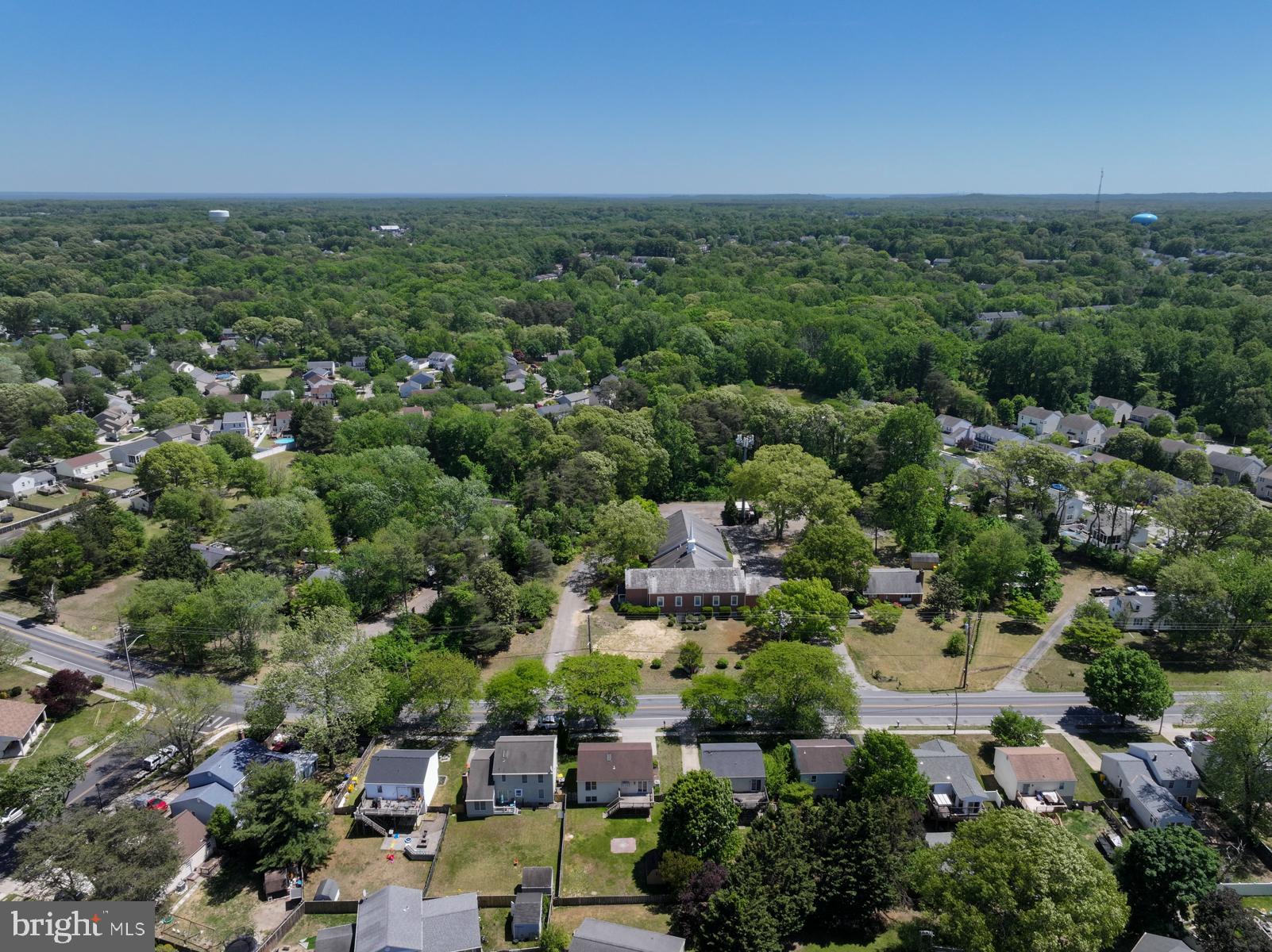 7838 Tick Neck Road Pasadena, MD 21122 - Photo 16 of 20 an aerial view of a houses with a yard