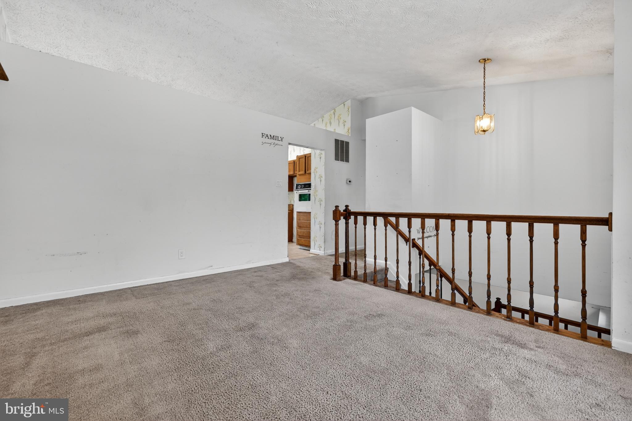 7838 Tick Neck Road Pasadena, MD 21122 - Photo 10 of 20 a view of a hallway with stairs