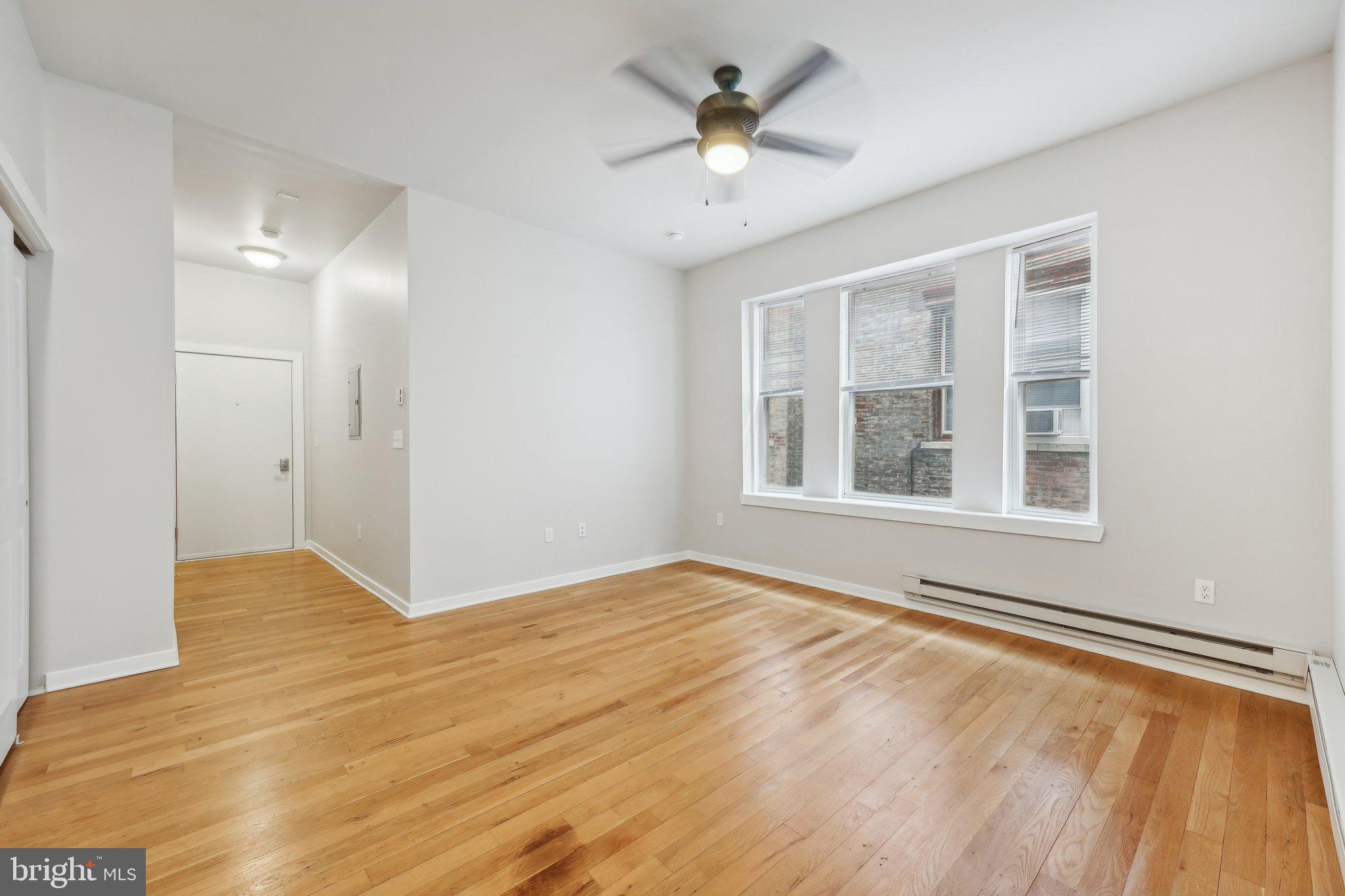 4300 Chestnut Street, Unit 1 Philadelphia, PA 19104 - Photo 13 of 30 a view of an empty room with a window