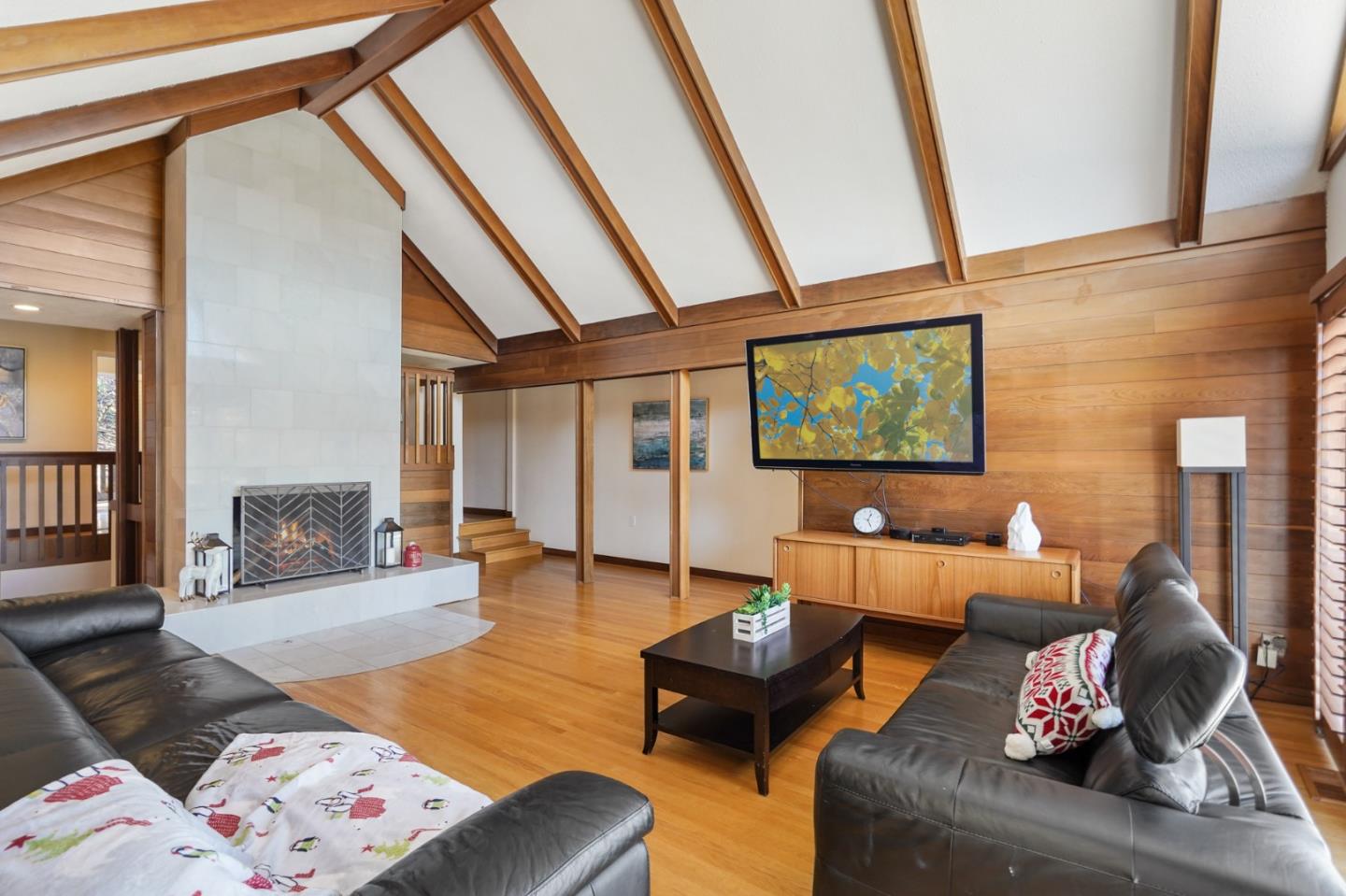 4015 Marsten Avenue Belmont, CA 94002 - Photo 16 of 53 a living room with furniture and a flat screen tv