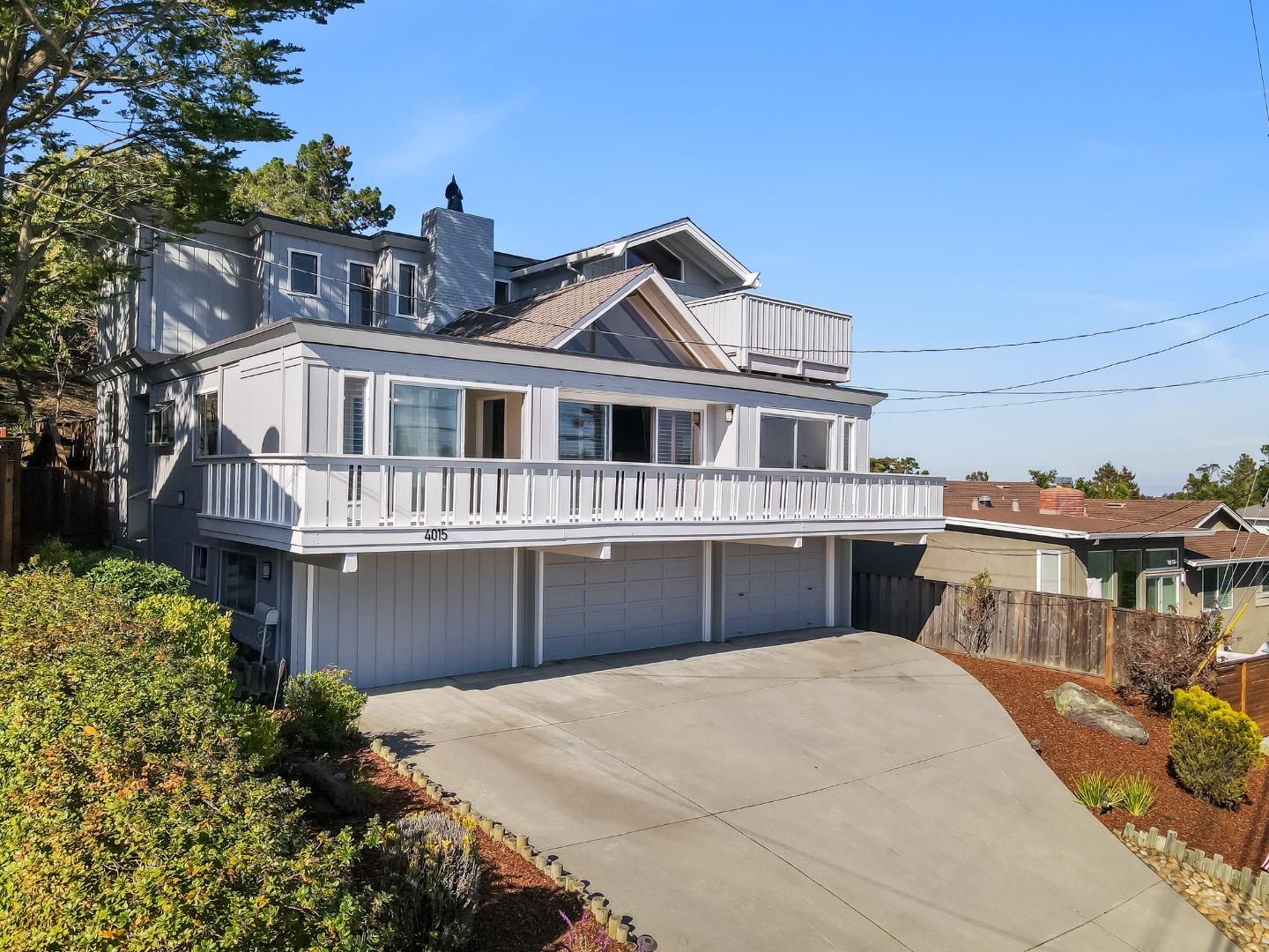 4015 Marsten Avenue Belmont, CA 94002 - Photo 2 of 53 a front view of a house with a yard and potted plants