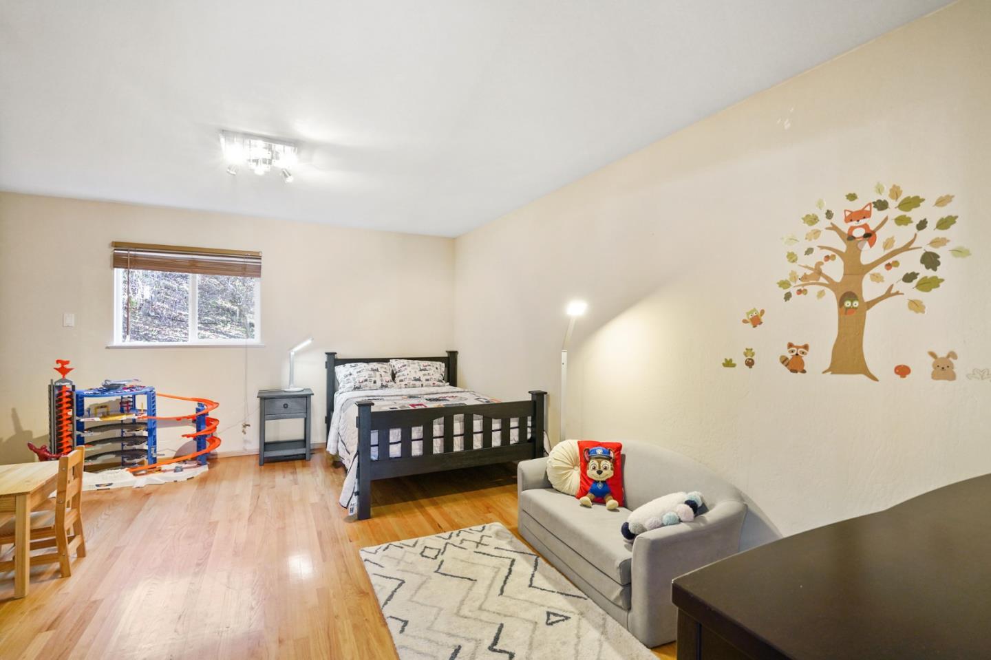 4015 Marsten Avenue Belmont, CA 94002 - Photo 27 of 53 a living room with furniture and wooden floor