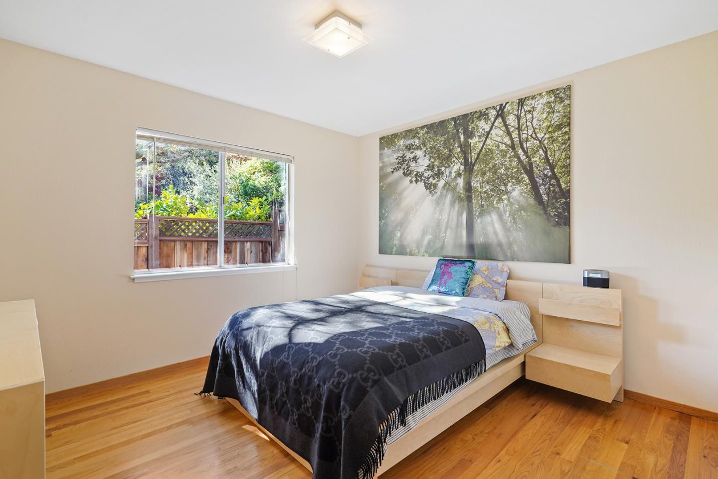 4015 Marsten Avenue Belmont, CA 94002 - Photo 31 of 53 a bedroom with a bed and a large window