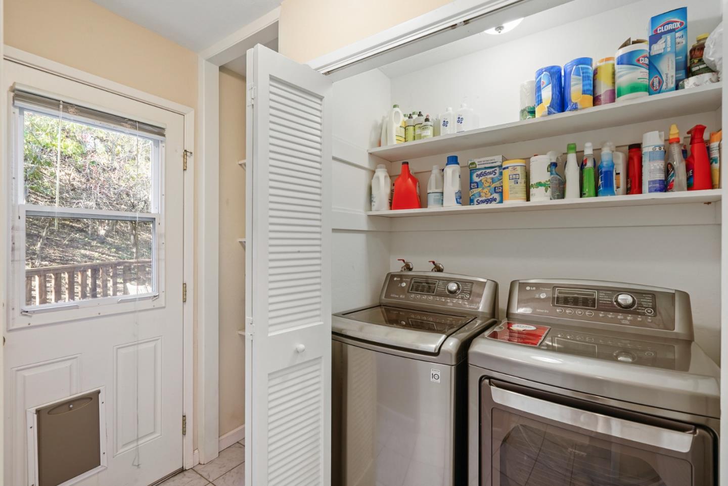 4015 Marsten Avenue Belmont, CA 94002 - Photo 34 of 53 a utility room with closet dryer and washer