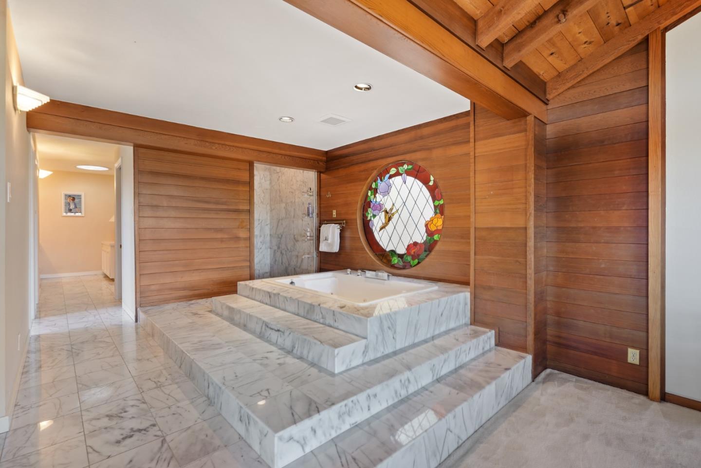 4015 Marsten Avenue Belmont, CA 94002 - Photo 39 of 53 a bedroom with a bed and a mirror