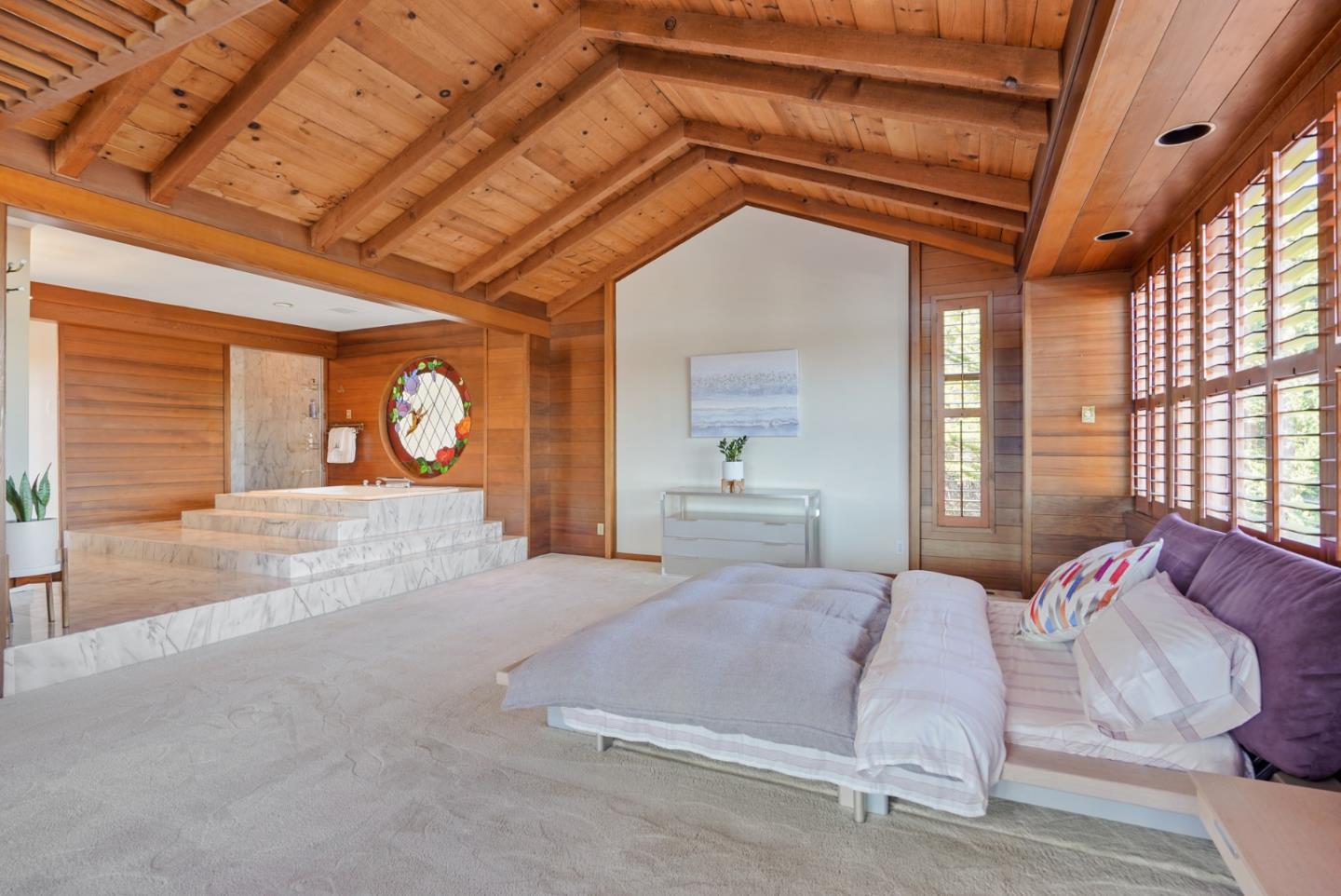 4015 Marsten Avenue Belmont, CA 94002 - Photo 42 of 53 a bed room with a bed and a potted plant