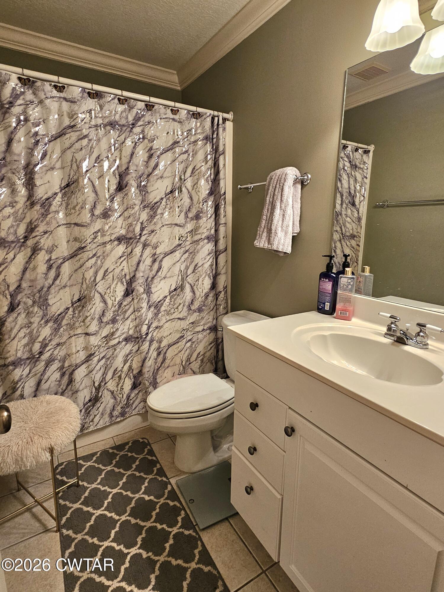129 Quail Ridge Jackson, TN 38305 - Photo 20 of 35 a bathroom with a sink toilet and shower