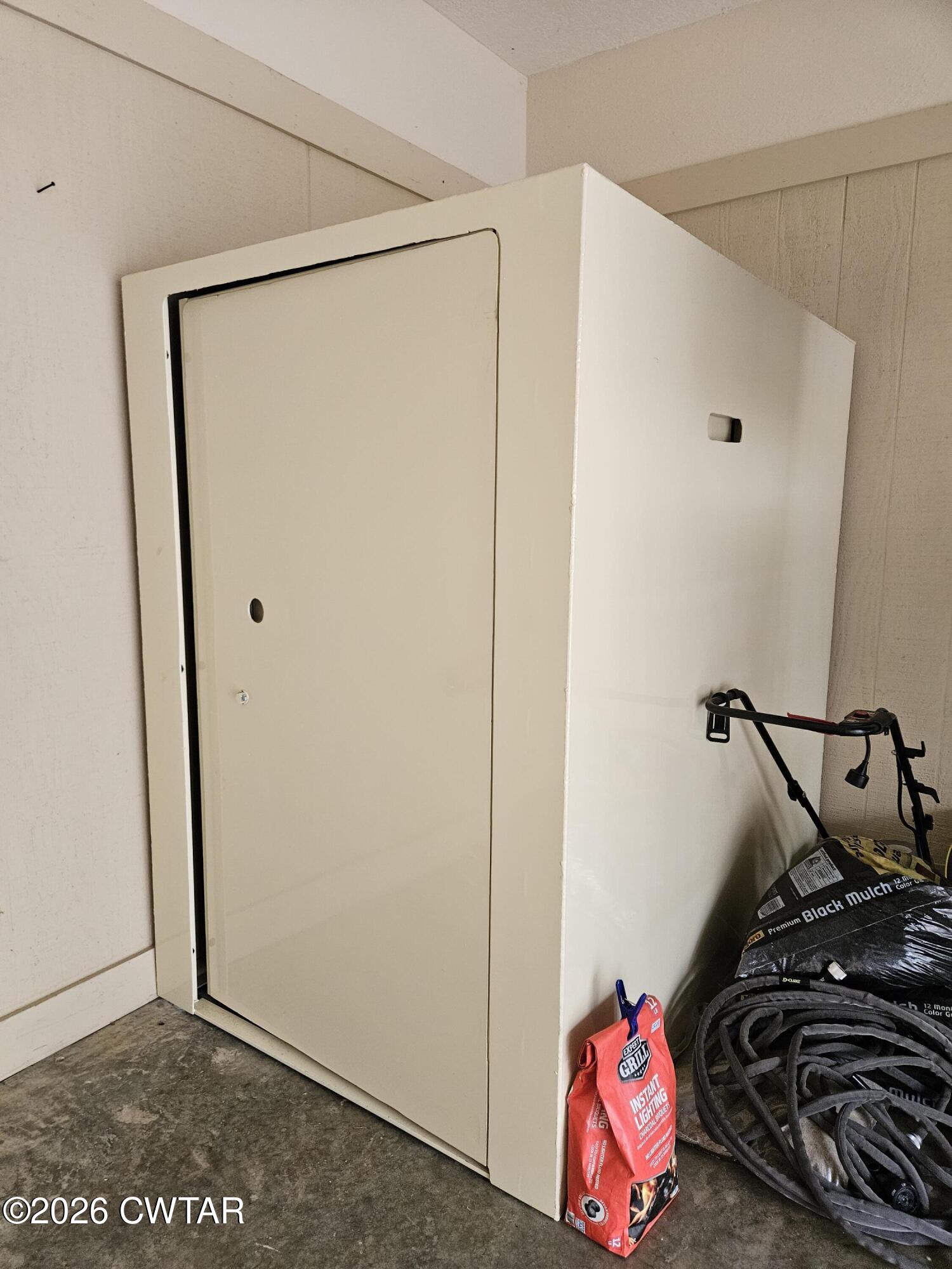 129 Quail Ridge Jackson, TN 38305 - Photo 29 of 35 a room with storage and utility