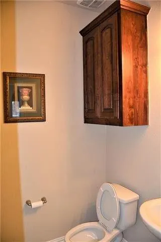 a bathroom with a toilet