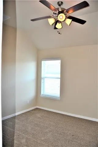 a view of a window in an empty room