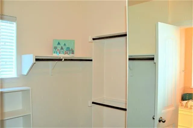 a view of an entryway with a door