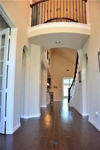 a view of entryway with wooden floor