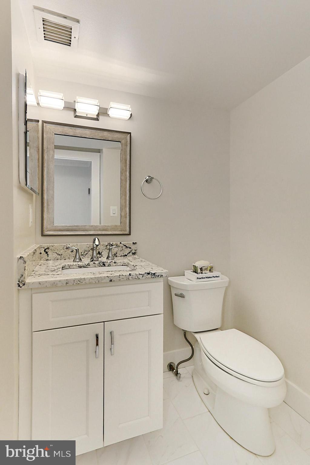 1101 South Arlington Ridge Road, Unit 309 Arlington, VA 22202 - Photo 22 of 47 Powder Room at Entry Door