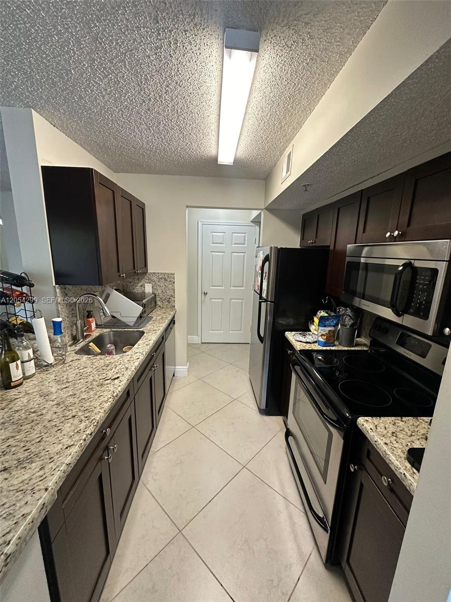 3830 Lyons Road, Unit 2033 Coconut Creek, FL 33073 - Photo 1 of 19