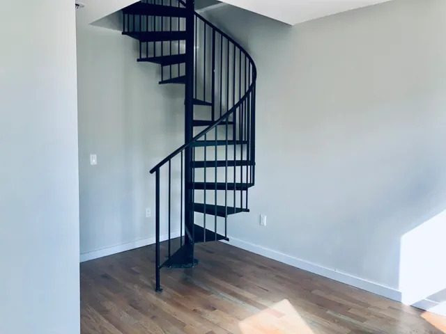 a view of entryway with wooden floor